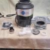 Garbage Disposal (stainless steel) Insinkerator 65. Mounting hardware is new. $75 USD's